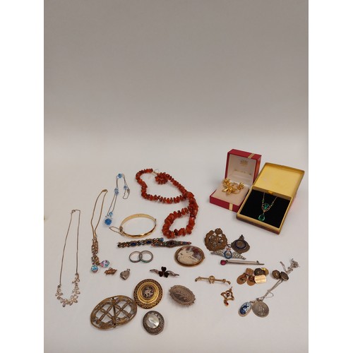 1277 - A quantity of bijouterie including glass bead necklaces, rolled gold pendant, gold plated cufflinks,... 