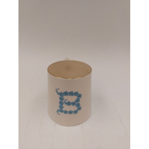 1352 - A Victorian Goss porcelain mug with initial 