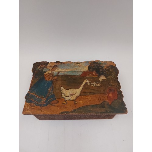 1360 - A pokerwork box with lid depicting girl walking a goose