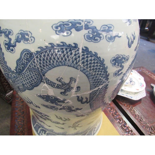 1020 - A Chinese blue and white urn of large proportions, restored. 51cm height.