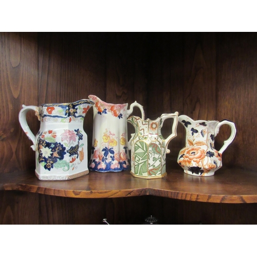 1025 - Four 19th Century decorative jugs including Mason's and Old Derby