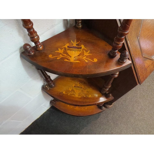 1040 - A walnut and marquetry four-tier corner whatnot with turned supports and urn detailing, 145cm high