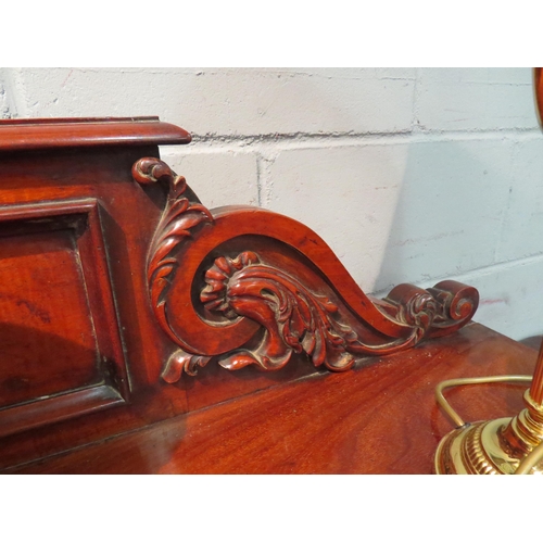 1050 - A mahogany sideboard with three drawers and wine cupboard within pedestal, 117cm high x 153cm wide x... 