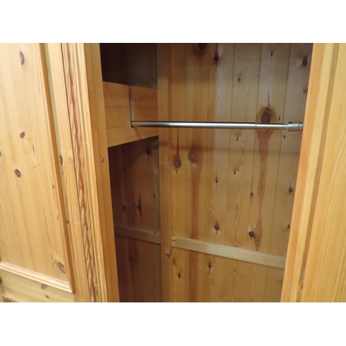 1063 - A natural pine triple door 