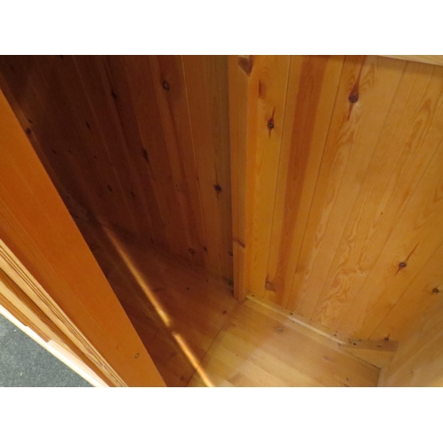 1063 - A natural pine triple door 