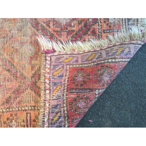 1072 - Two rugs, both Middle Eastern, red ground 124cm x 88cm, worn, and 206cm x 148cm some staining    (E)... 