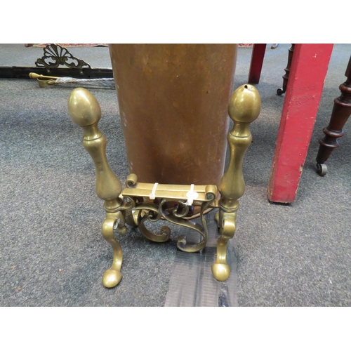 1104 - A copper umbrella stand with handle together with brass fireside accompanyments and a pair of fire d... 