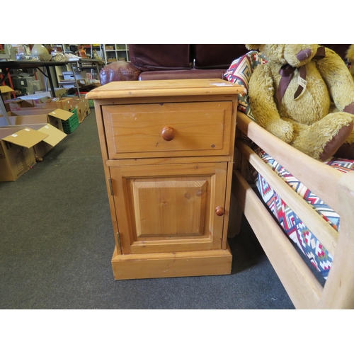 1145 - A pair of country pine bedside cabinets. 60cm high x 39cm wide x 28cm deep