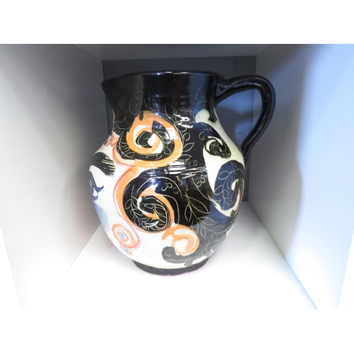 1266 - A Picasso style pottery jug, 27cm high