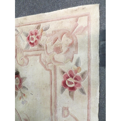 1541 - A Chinese rug, beige ground with floral design, 240cm x 152cm   (D)