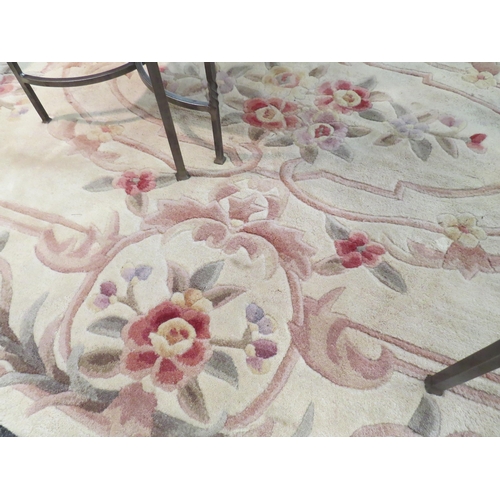 1541 - A Chinese rug, beige ground with floral design, 240cm x 152cm   (D)