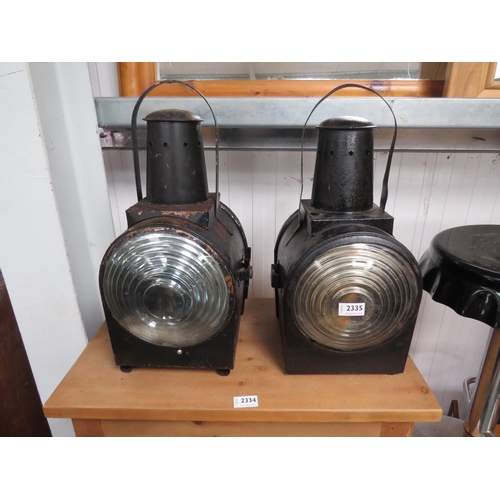 2335 - A pair of road lamps