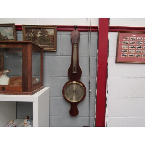 1270 - An early 19th Century aneroid barometer/thermometer in a mahogany case, Market Place, Norwich