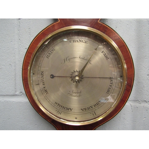 1270 - An early 19th Century aneroid barometer/thermometer in a mahogany case, Market Place, Norwich