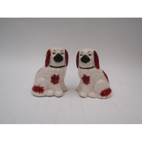 1336 - A small pair of red and white Staffordshire dogs 10cm high