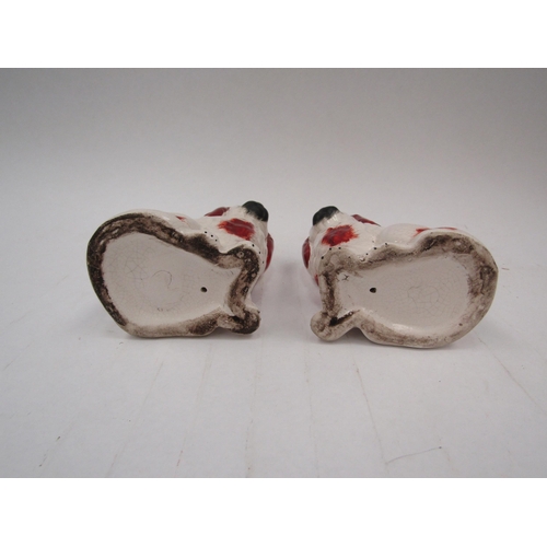 1336 - A small pair of red and white Staffordshire dogs 10cm high