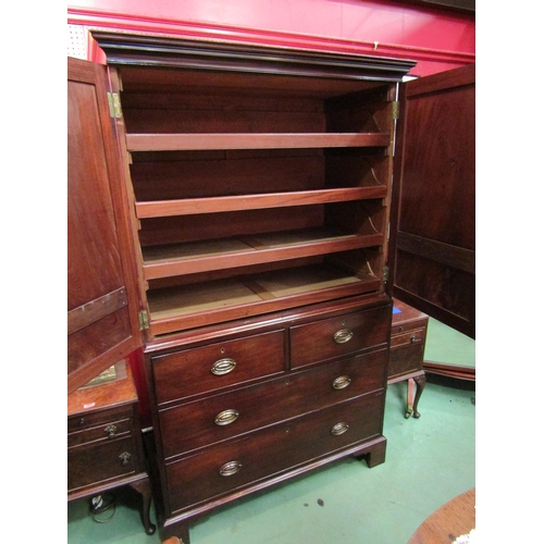 4042 - Circa 1780 a flame mahogany country house linen press the two doors with brass door bar enclosing fo... 