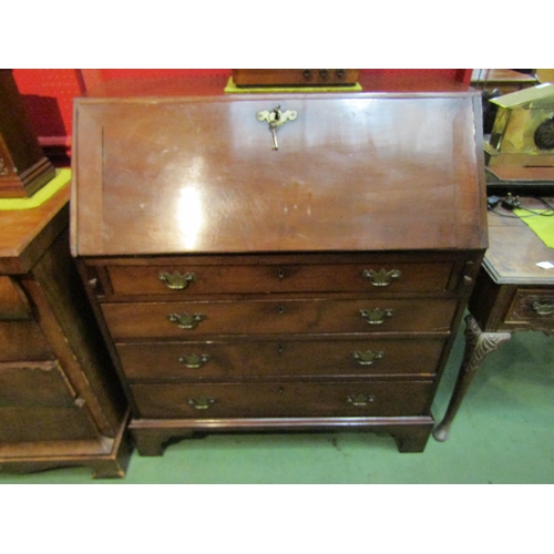 4087 - A George III circa 1800 Cherrywood writing Bureau the fitted interior over four graduating long draw... 