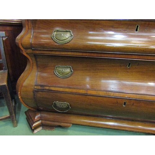 4127 - Circa 1850's a Dutch walnut bombe bureau the serpentine shape fall having a well fitted interior and... 