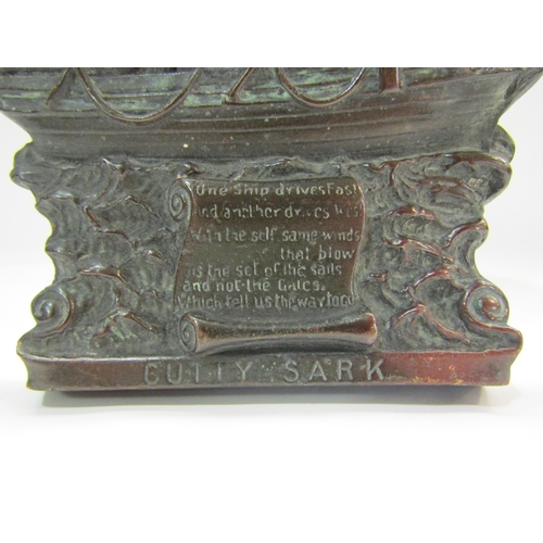 4270 - An oversized (24cm) knocker in bronzed or coppered cast iron in the form of Cutty Sark in full sail ... 