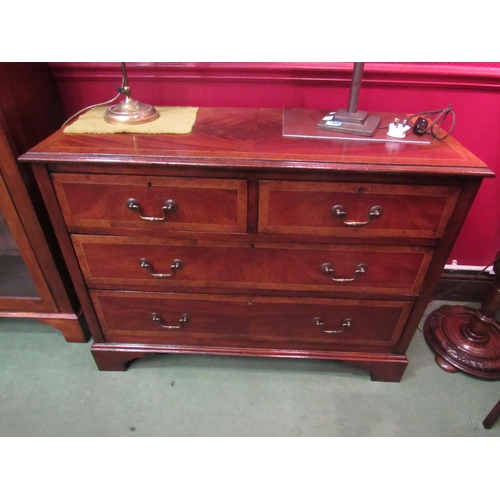 4038 - A George III revival burr walnut crossbanded flame mahogany chest of two short over two long drawers... 