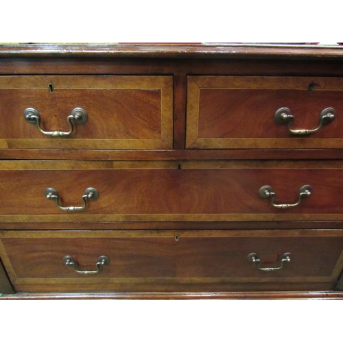 4038 - A George III revival burr walnut crossbanded flame mahogany chest of two short over two long drawers... 