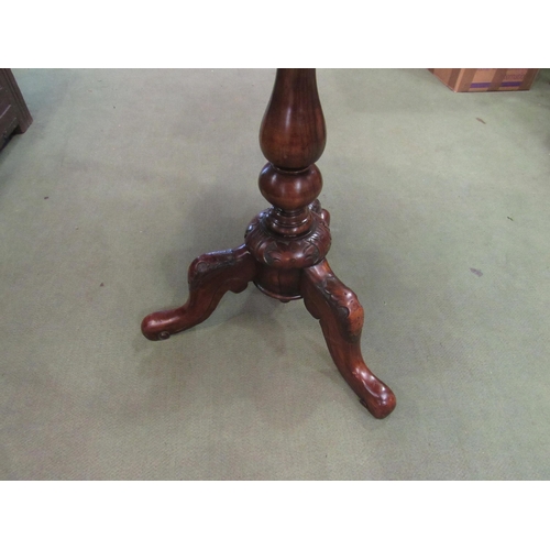 4060 - A Victorian carved walnut tilt-top table with canted rosewood and fruitwood top, 69cm high x 67cm lo... 