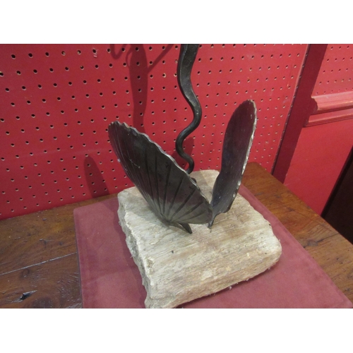 4065 - A metal sculpture of a mermaid between two clam shells on a wooden base, 45cm high     (R) £20