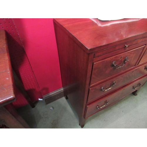 4073 - A George III revival flame mahogany bachelor's chest the brushing slide with tooled leather insert o... 