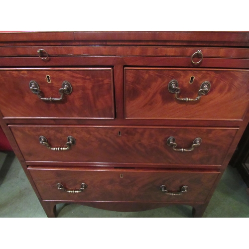 4073 - A George III revival flame mahogany bachelor's chest the brushing slide with tooled leather insert o... 