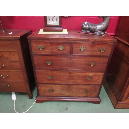 4115 - A 19th Century flame mahogany caddy top chest of two short over three graduating long drawers on bra... 