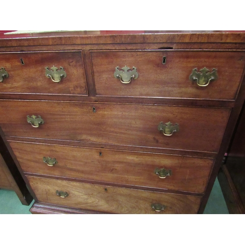 4115 - A 19th Century flame mahogany caddy top chest of two short over three graduating long drawers on bra... 