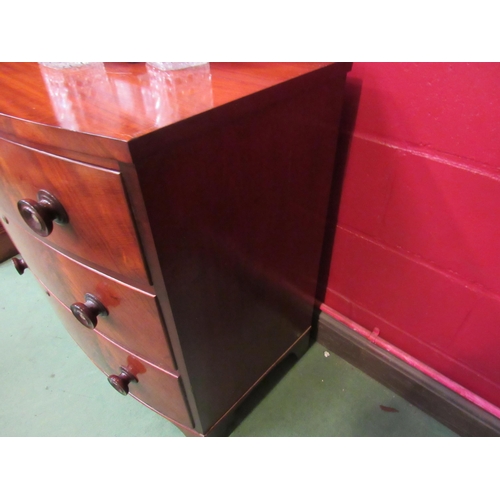 4121 - A 19th century mahogany bow front chest of three long drawers, 85cm high x 91cm wide x 49cm deep