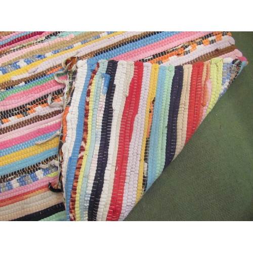 4145 - A multi-coloured stripe design small rug, 125cm x 68cm     (R) £15