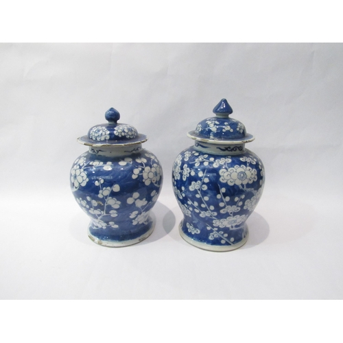 4235 - Two Chinese blue and white vases with covers, character mark to bases a/f, 21cm high