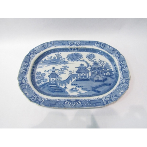 4240 - A Georgian blue and white transfer ware pottery platter decorated with chinoiserie scene, 28cm x 37.... 