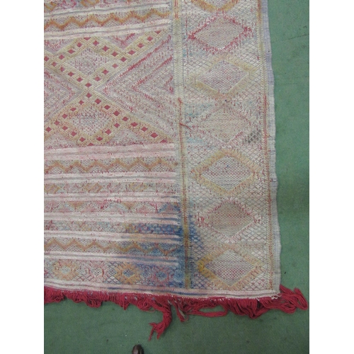 4420 - An Eastern hand woven geometric design rug, badly stained, a/f,     (R) £35