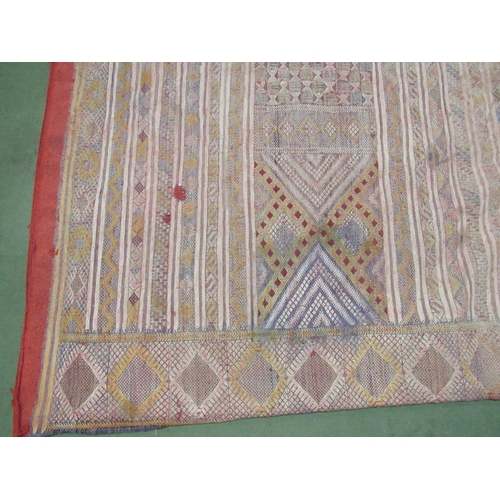 4420 - An Eastern hand woven geometric design rug, badly stained, a/f,     (R) £35