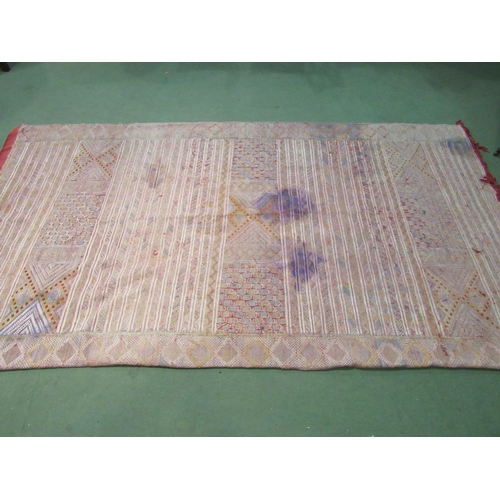 4420 - An Eastern hand woven geometric design rug, badly stained, a/f,     (R) £35