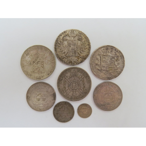 9019 - A collection of foreign silver coinage in 1780 Maria Theresiad, 19th Century South African and Frenc... 