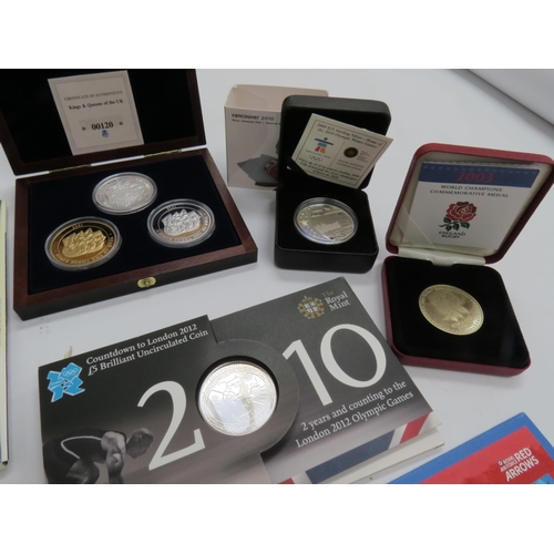 9052 - A collection of Royal Mint and other coin packs and sets including Olympic Games related, Royal Comm... 