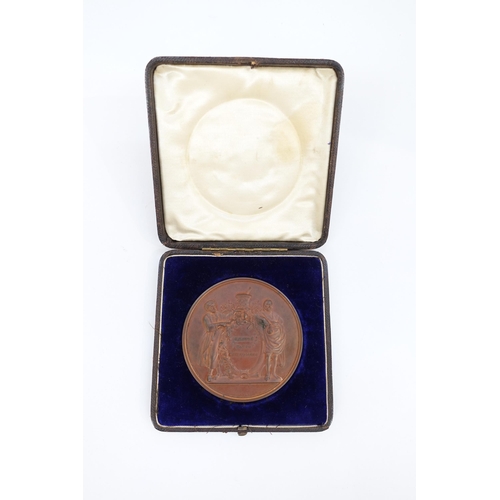 9113 - A cased Pharmaceutical Society of Great Britain bronze medal designed by L.C Wyon and awarded to Aub... 