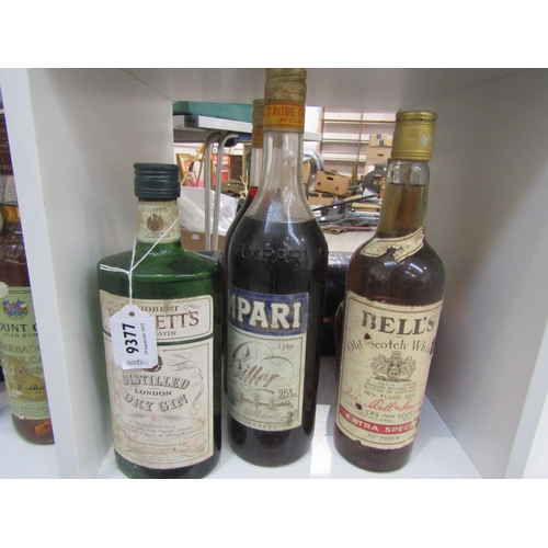 9377 - 5 bottles including Campari, Burnett's Gin, Courvoisier etc