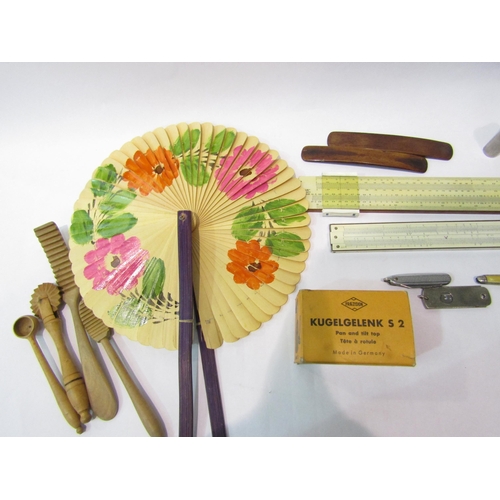 4266 - Two cased slide rules, a hand-painted fan, wooden kitchen utensils, horn powder flask a/f, two bone ... 