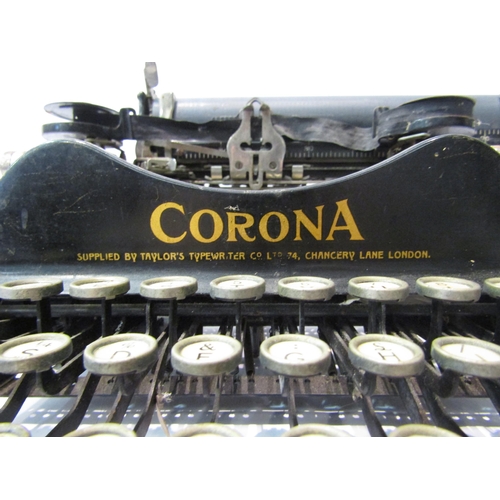 4280 - A small scale cased Corona typewriter, case a/f