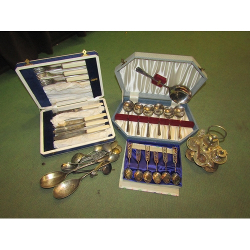 4393 - Mixed cased and uncased flatware including four piece cruet in stand