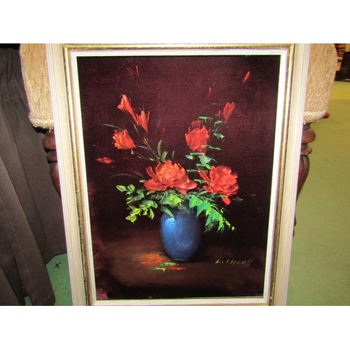 4395 - A gilt framed acrylic on velvet of red flowers with green leaves in a blue bowl, signed lower right ... 