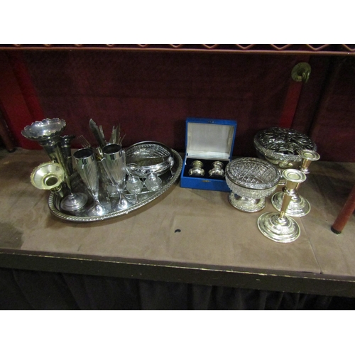 4402 - Assorted plated and metalware including cased salt and pepper, pair of candlesticks, large oval tray... 