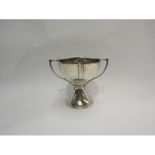 4312 - A two handled silver trophy form bowl, dented, 10cm high