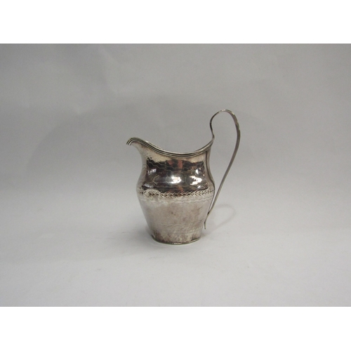 4314 - A Georgian silver cream jug, a/f